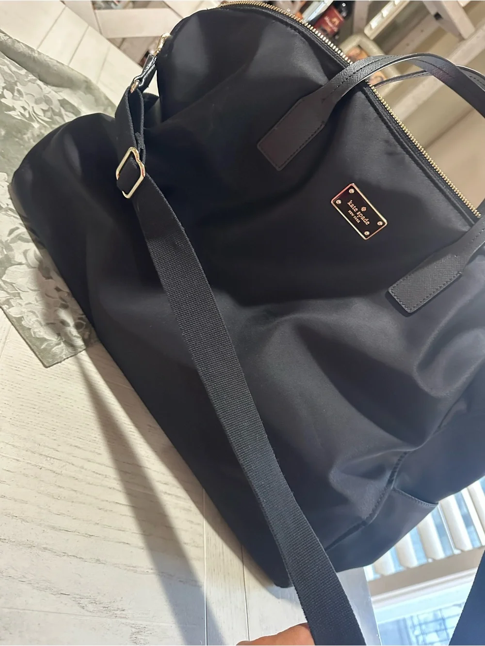 kate spade black nylon duffel with gold hardware